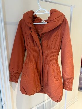 Orange puffer jacket